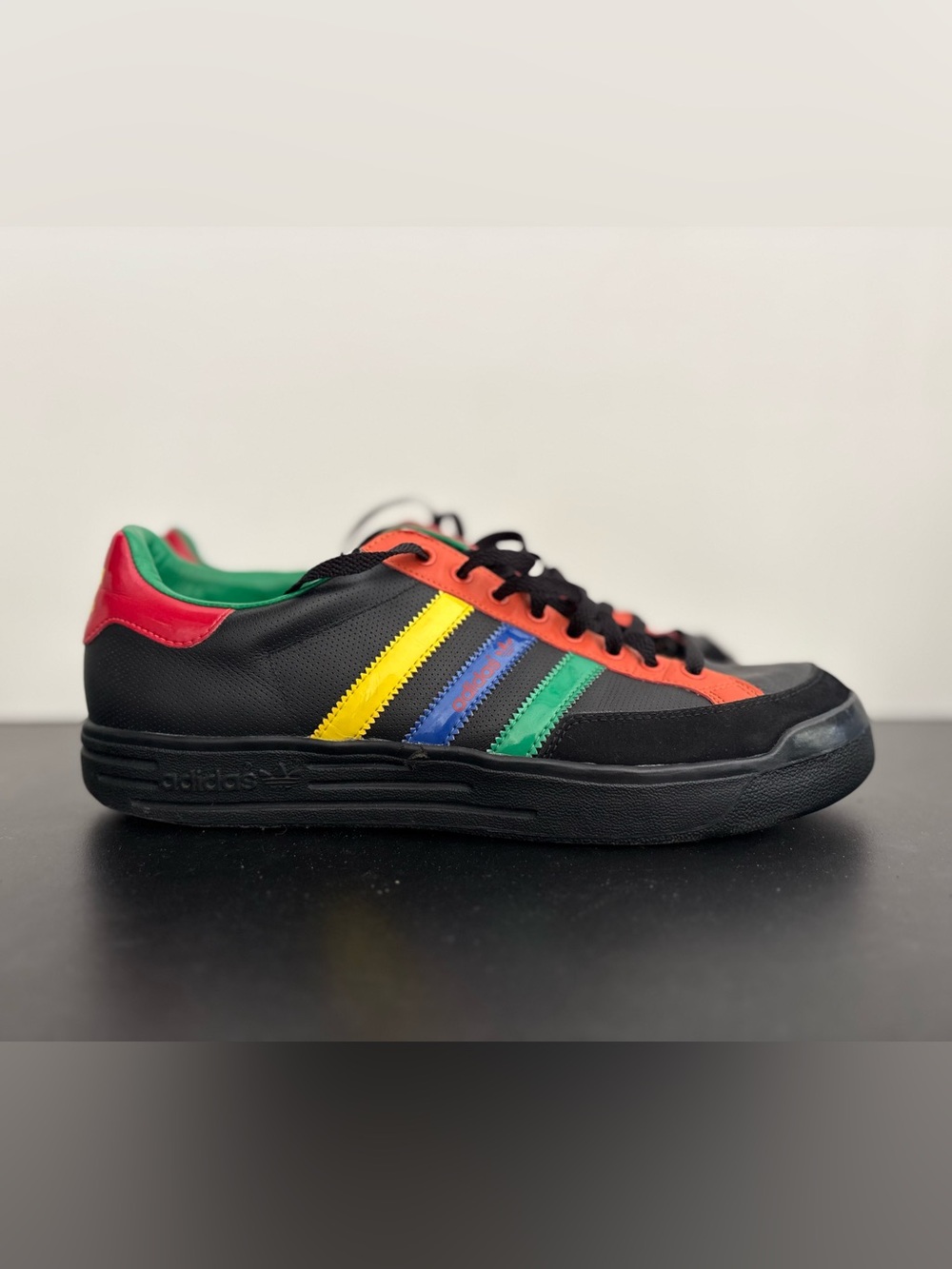 adidas Men’s Nastase Rasta Black Sneaker with Yellow, Blue, Green & Red Shoes